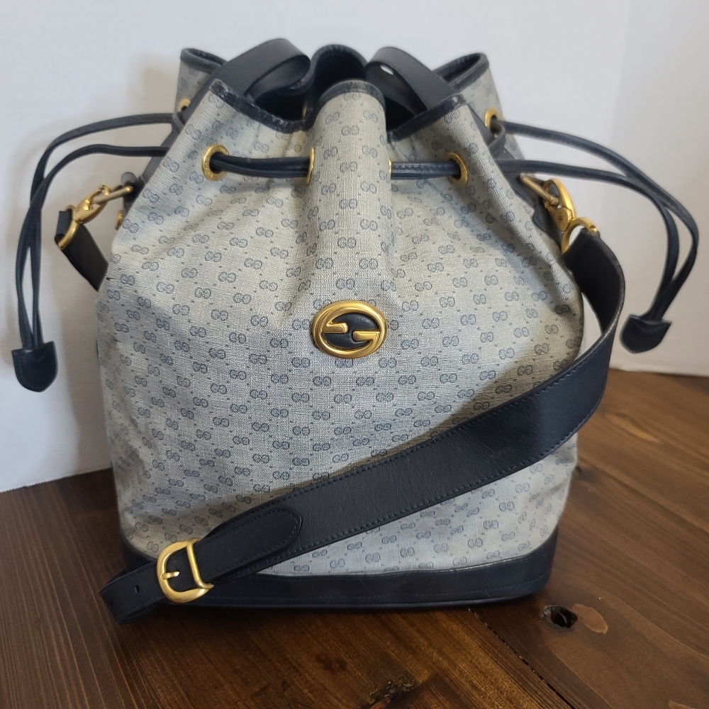 TODAY ONLY $200 SALE🎉 Authentic Gucci Monogram Navy & Gold Shoulder Bucket Bag.